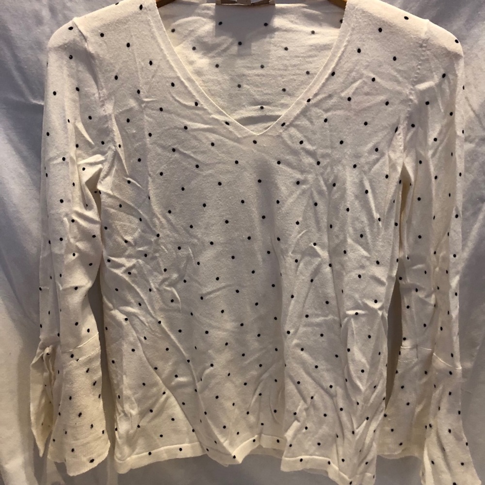 White top with black polkadots